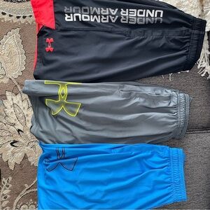 Under Armour Loose Fit Shorts Trio in Black, Gray, and Blue